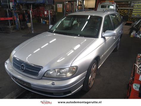 Opel Omega B Caravan 2 2 16V Schrottauto 2000 Grau