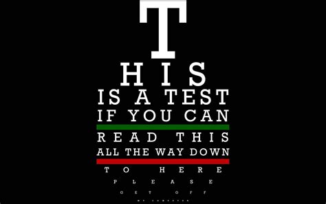 Download Simple Eye Test On Black Background Wallpaper