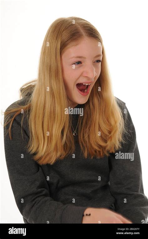 Pretty Blonde Teenage Girl Yawning Isolated On White Background Stock Photo Alamy