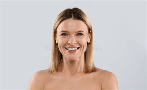 Portrait Of Attractive Half Naked Middle Aged Blonde Woman Stock Image