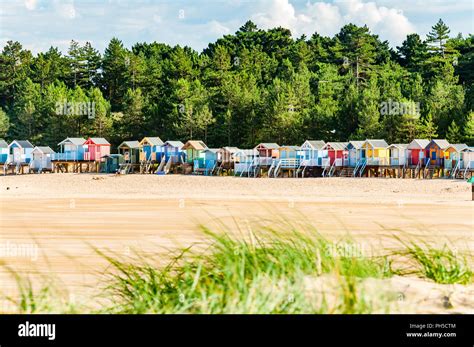 Holkham beach and beach huts Stock Photo - Alamy