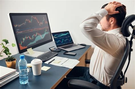 Premium Photo Worried Businessman Looking At Charts Stressed By News