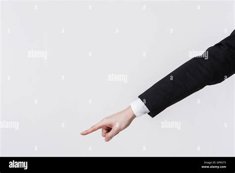 Hand pointing down Stock Photo - Alamy