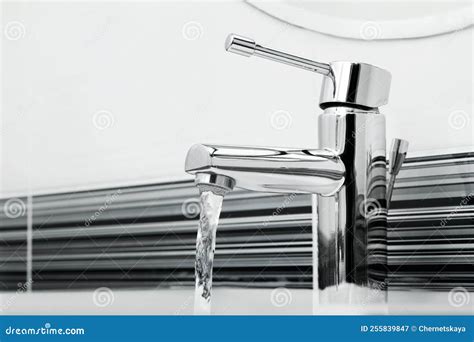 Stream Of Water Flowing From Tap In Bathroom Stock Image Image Of