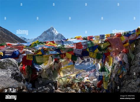 Mountain Peak Above Prayer Flags In The Himalayan Mountains Stock Photo