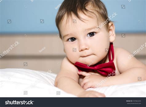 Naked Baby Boy Smiling Wearing Bow Stock Photo 597864245 Shutterstock