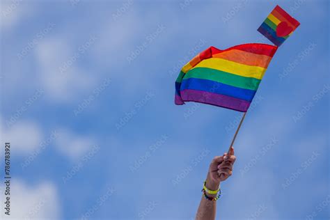 Hand Holding Rainbow Gay Flag Symbol Of Lgbt People Diversity Of