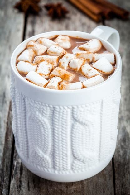 Premium Photo Hot Cocoa With Marshmallows On Wooden Table
