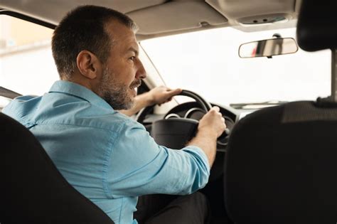 Premium Photo Middle Aged Man Driving Sitting In New Auto Rear View