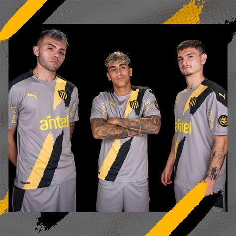 Peñarol presentó la nueva camiseta alternativa para el 2021 Padre y