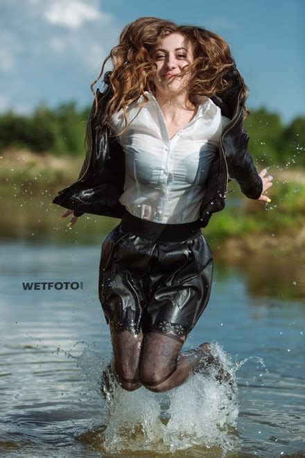 Fully Clothed Girl In Black Leather Suit Blouse And Tights Get Wet In