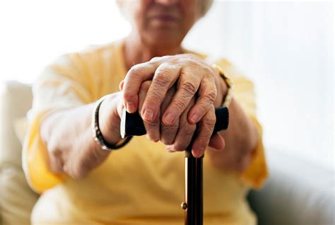 Senior Woman Holding Walking Stick Premium Photo Rawpixel