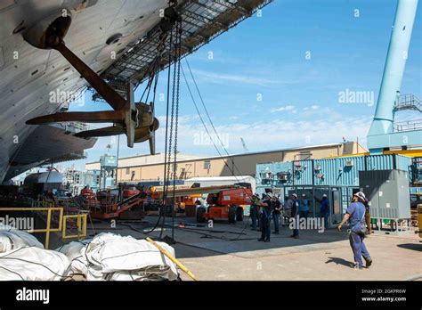 Newport News Shipbuilding Contractors Remove The Port Side Anchor From