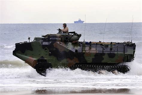 File News Photo 120206 M Fw736 006 Marines Drive Amphibious Assault Vehicles Along