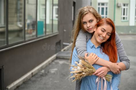 Same Sex Relationships Happy Lesbian Couple With Dried Flowers Stock Image Image Of Fiance