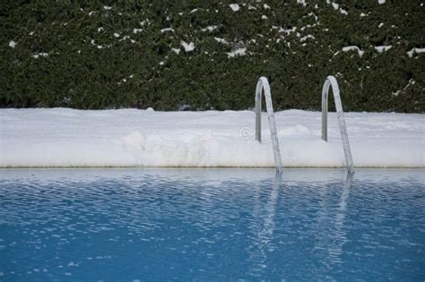 Swimming pool under snow stock photo. Image of snowstorm - 23137384