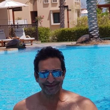 Wasim Akram Claps Back At Trolls By Wearing A Suit While Swimming