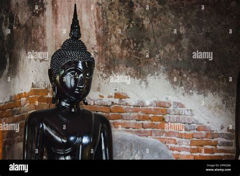 Black Buddha Statue With Old Walls In Thai Temples Stock Photo Alamy