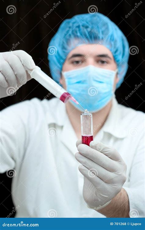 Lab Worker Examining A Blood Stock Photo Image Of Glove Glass