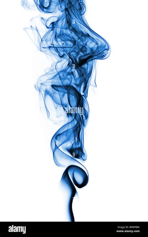 smoke trail colored blue creating patterns Stock Photo - Alamy