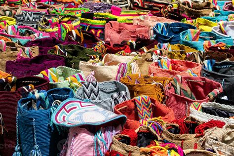 Street selling in Bogota of traditional bags hand knitted by women of