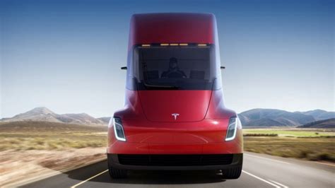 Tesla Presents Electric Truck, Updated Sports Car