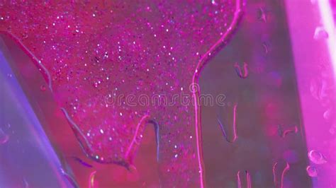 Glitter Fluid Drip Water Droplets Spill Neon Pink Stock Footage Video