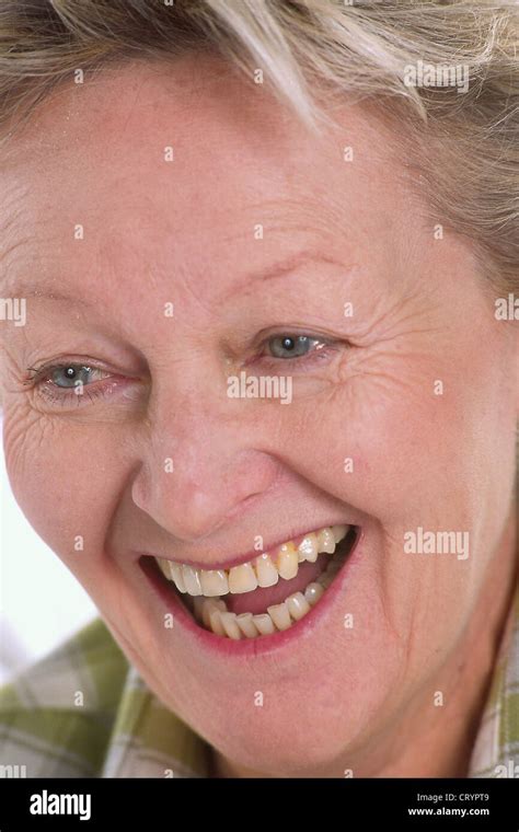 Portrait Of 65 Yr Old Woman Stock Photo Alamy