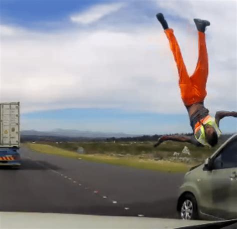 Horrifying Moment Road Worker Cartwheels Through The Air After He S Hit By Speeding Car On Busy