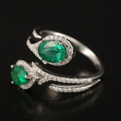 Oscar Friedman 18k Emerald And Diamond Bypass Ring Ebth