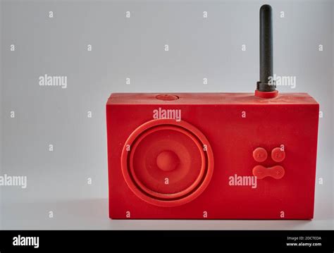 Red radio receiver on color white background Stock Photo - Alamy