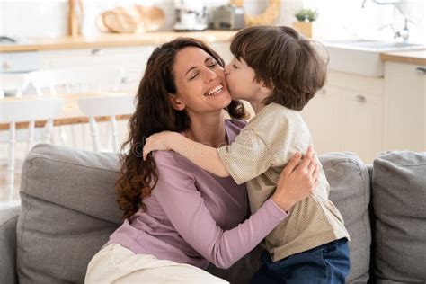 Son Boy Give Mom Kiss In Cheek Embrace Single Parent Mum On Mother Day