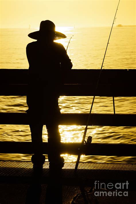 Balboa Pier Fisherman Fishing In Newport Beach California Photograph By