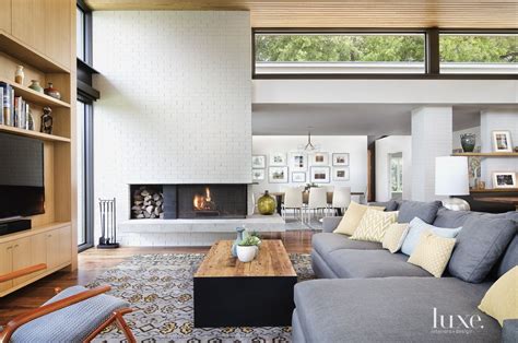 Contemporary White Living Room With White Brick Fireplace Luxe