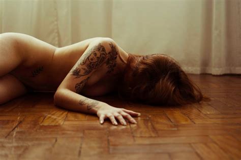 Premium Photo Naked Woman Lying On Floor At Home