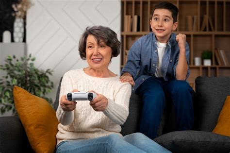 Premium Photo Front View Grandson And Grandmother Playing Game