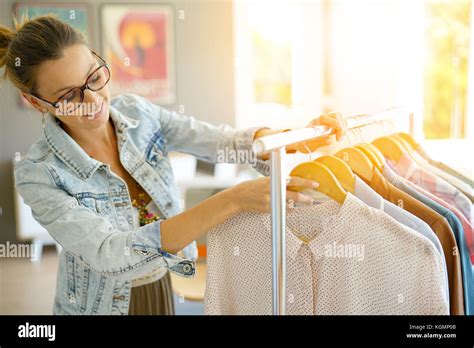 Trendy Saleswoman Working In Clothing Store Stock Photo Alamy