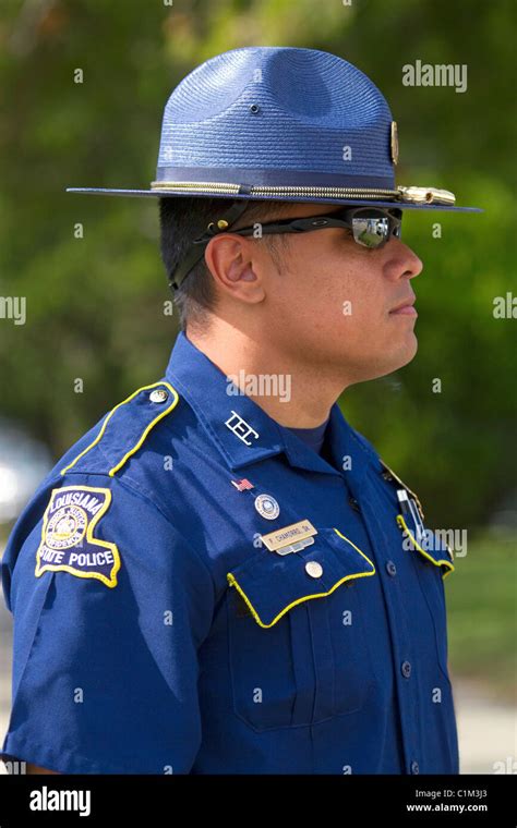 Louisiana State Trooper watches over a demonstration in Baton Rouge ...