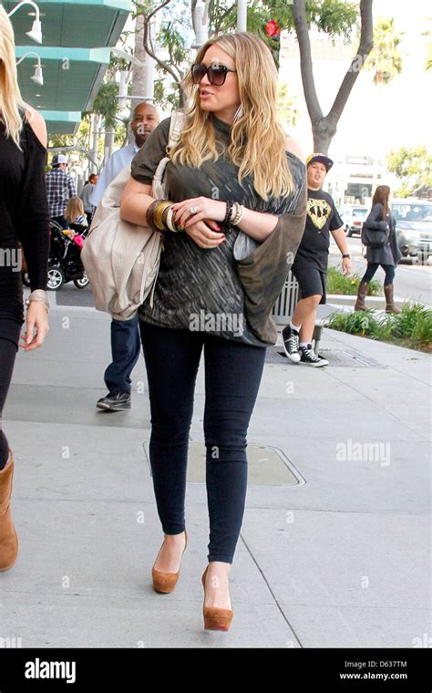 Hilary Duff Shows Off Her Growing Baby Bump While Out Shopping In