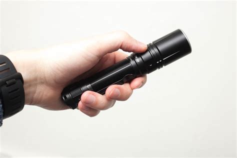 Fenix Tk Review Laser Flashlight With Meters Feet Beam