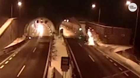 Crash sends BMW car flying into tunnel roof