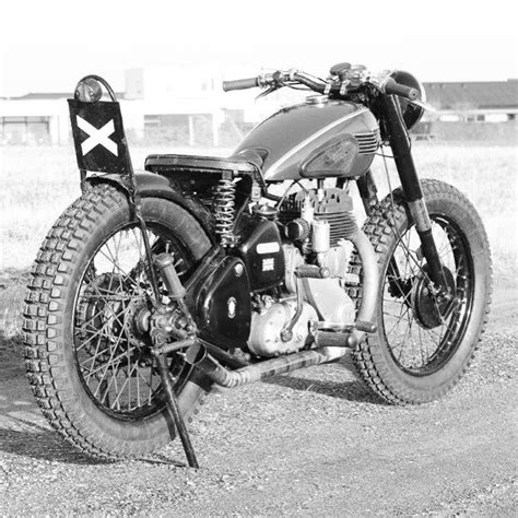 Black And White Photograph Of An Old Motorcycle