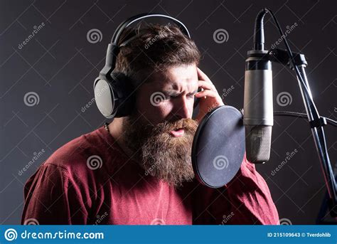 Man With Microphone Singing Song Musician In Music Hall Guy Meloman Singing In Karaoke Stock