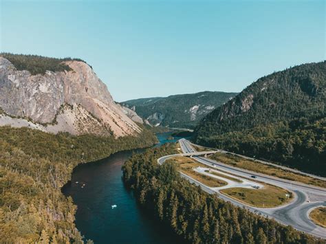 Clear Sky Over River Forest And Hills · Free Stock Photo