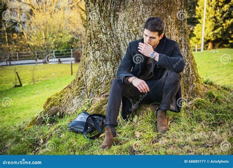 Handsome Young Man Leaning Against Tree Stock Image Image Of