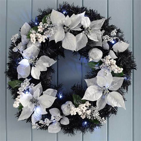 Decorated Pre Lit Wreath Illuminated With 20 Cool White Led Lights 60