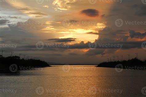 colorful dramatic sky with clouds at sunset. Sunset in the lake 9560999 Stock Photo at Vecteezy