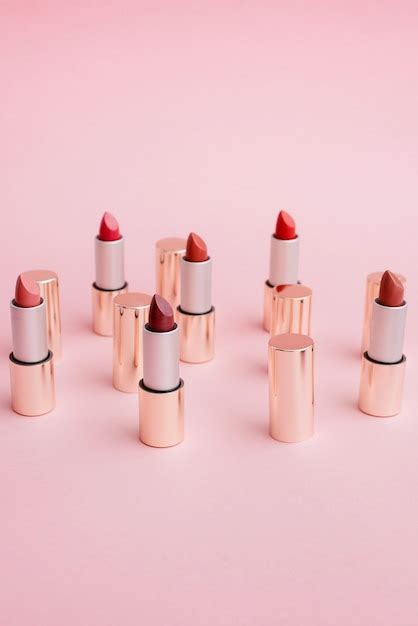 Premium Photo Many Luxury Gold Lipsticks In Different Shades Of Pink