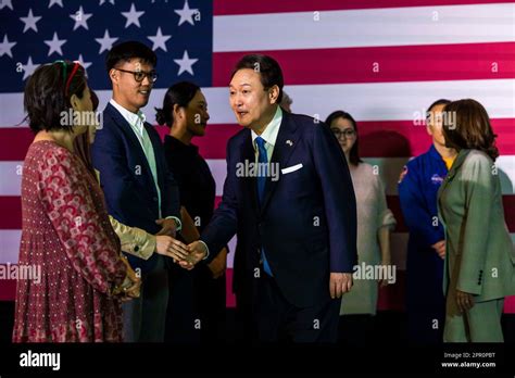 South Korean President Yoon Suk Yeol C Greets Korean American