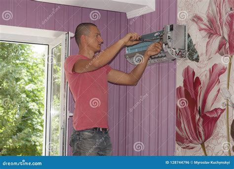 Split system installation stock photo. Image of modern - 128744796